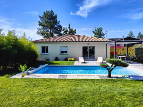 Villa entre ville et océan avec piscine chauffée